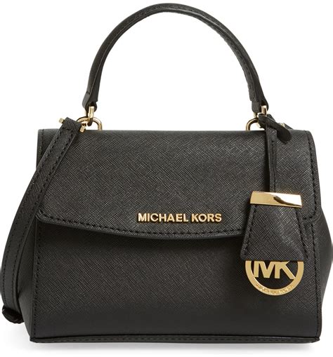 Michael kors satchel crossbody - • Satchel • Leather • 100% leather from tanneries meeting the highest standards of environmental performance • 12.25"W X 7.5"H X 5.25"D • Exterior details: detachable crossbody strap, back slip pocket • Interior details: back zip pocket and front slip pocket • Lining: 100% polyester • Zip fastening • Imported •Dust bag not ...